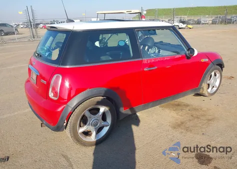 2006 Mini Cooper z USA, uszkodzony, nr VIN WMWRC33596TK65253